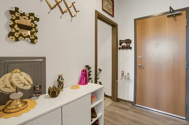 a view of a hallway with washer and dryer