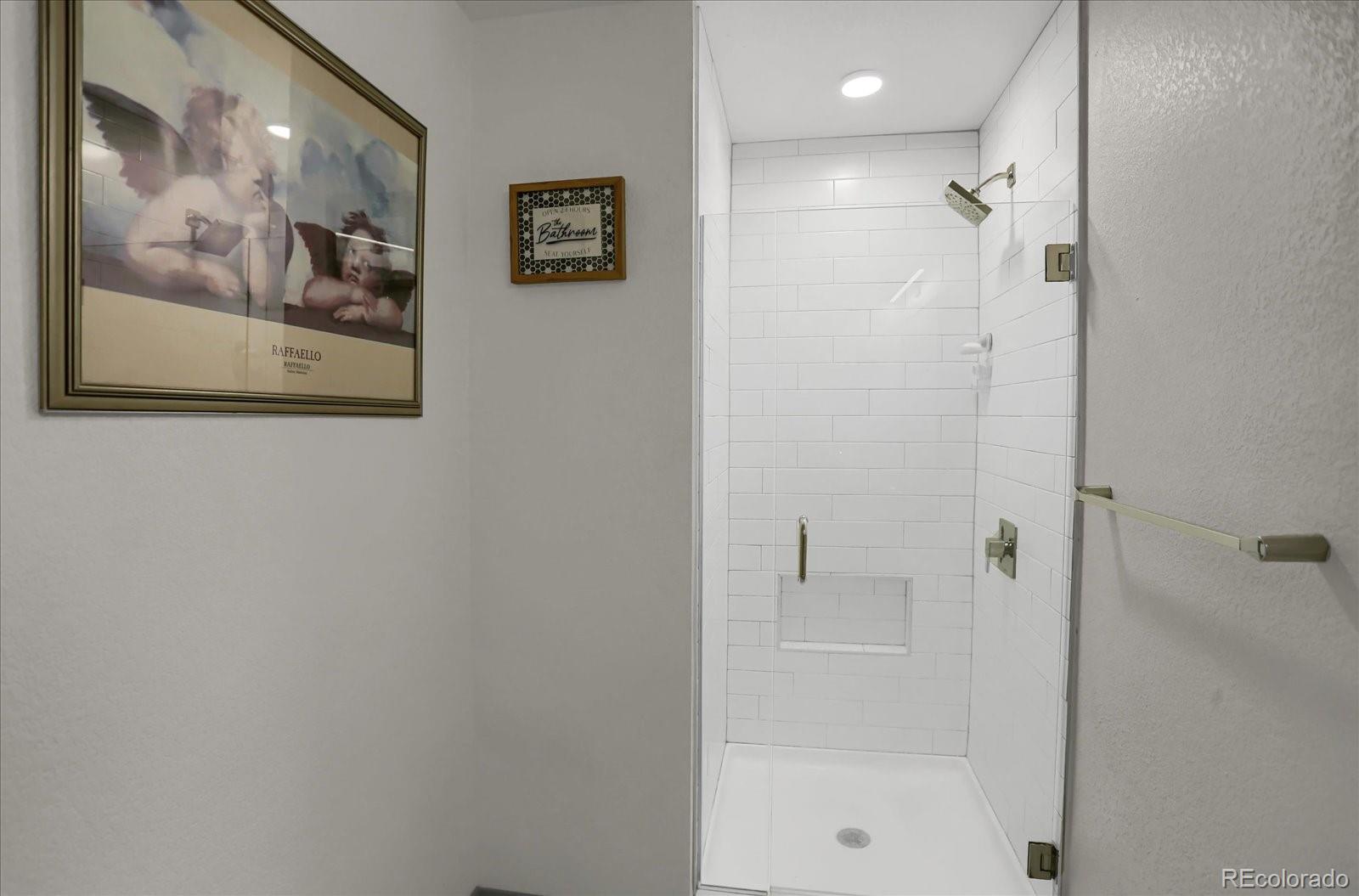 603 Inca Street, Unit 423 Denver, CO 80204 - Photo 14 of 20 a bathroom with a shower
