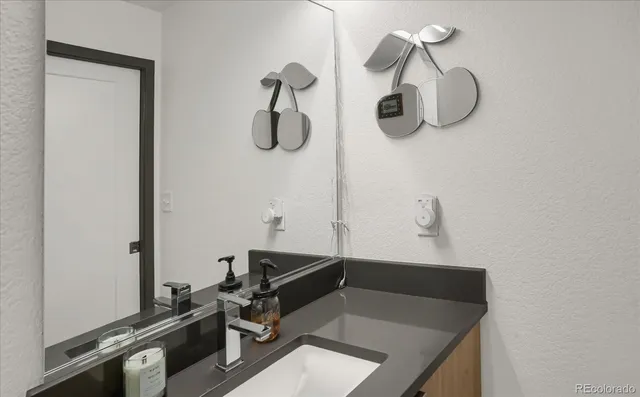 a vase of flowers sitting on a table