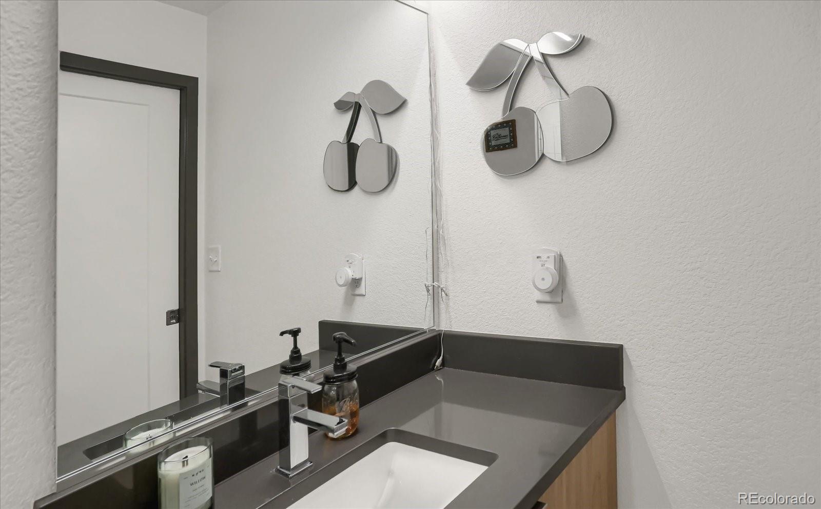 603 Inca Street, Unit 423 Denver, CO 80204 - Photo 15 of 20 a bathroom with a shower