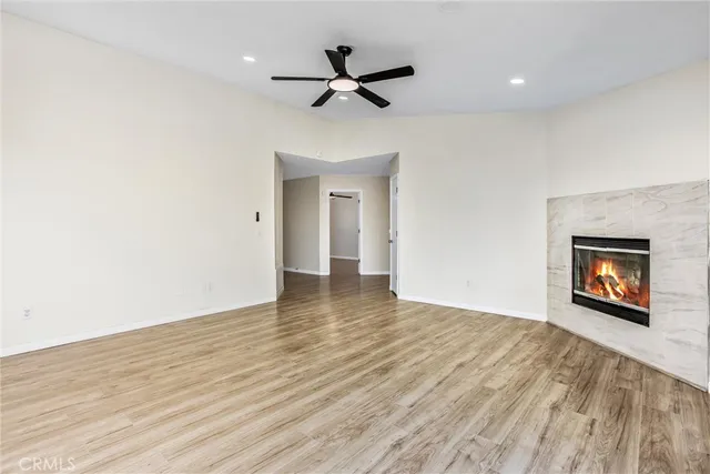 a kitchen with white cabinets stainless steel appliances and sink