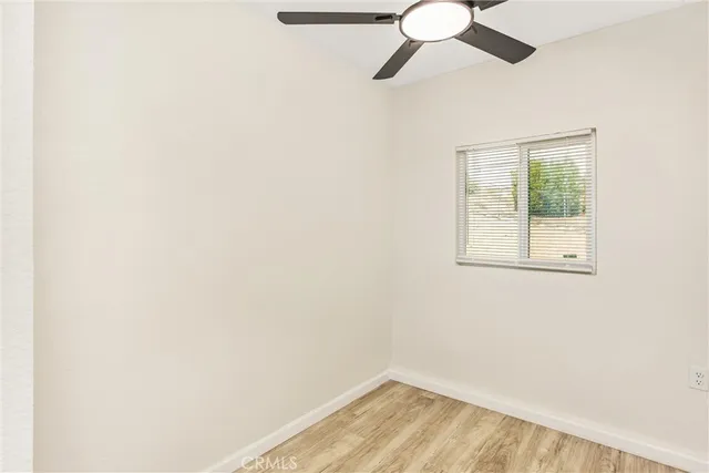 a bathroom with a toilet and shower