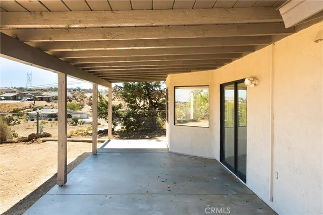 an aerial view of residential building and parking space