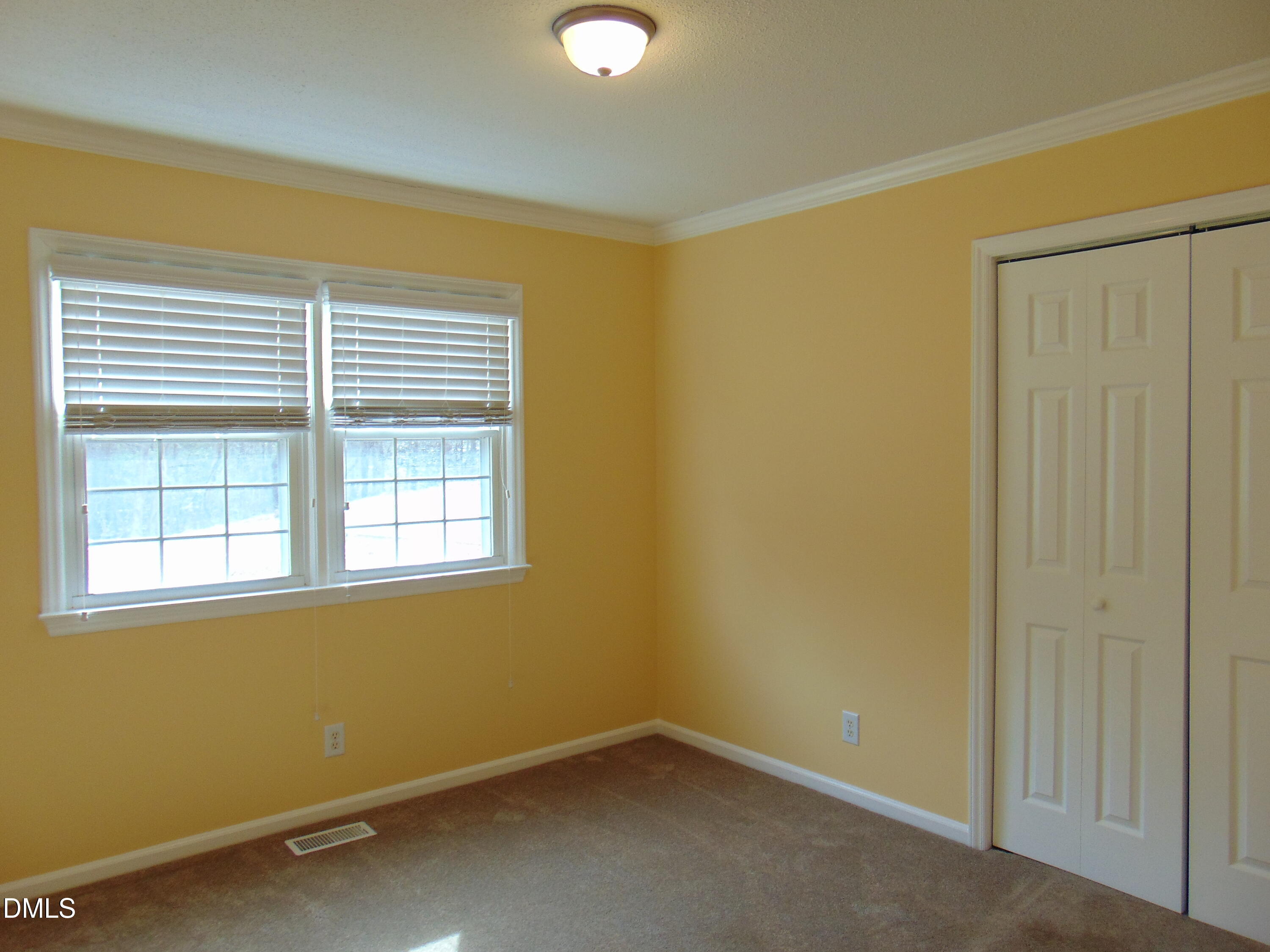 442 Gus Road Durham, NC 27703 - Photo 25 of 56 an empty room with a window