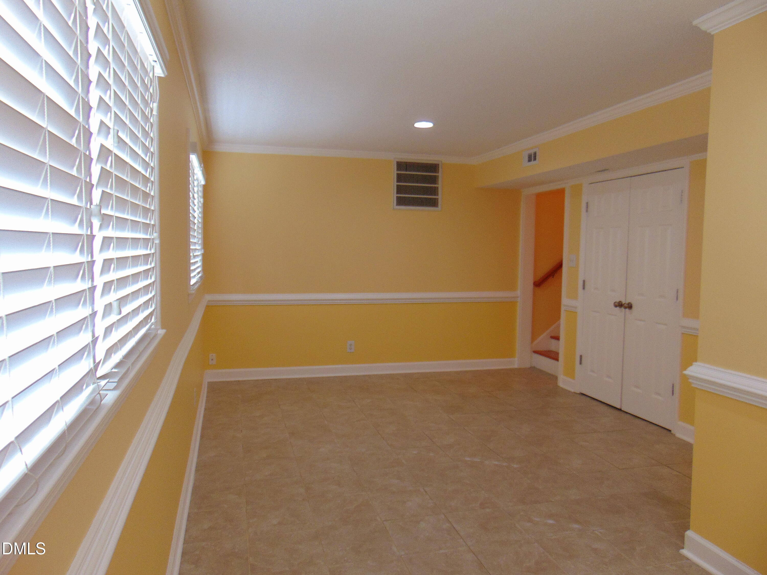 442 Gus Road Durham, NC 27703 - Photo 34 of 56 a view of an empty room with a window