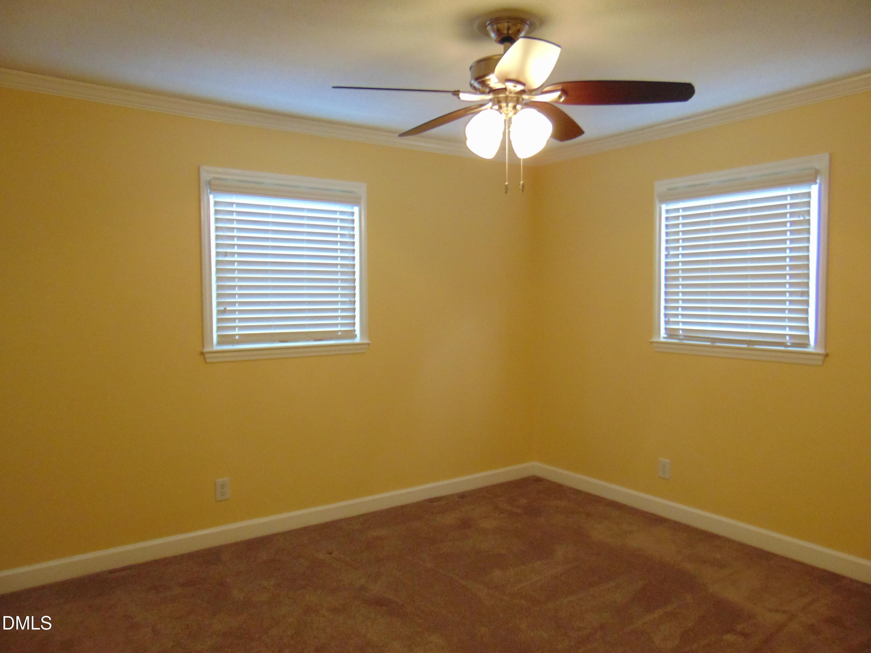 442 Gus Road Durham, NC 27703 - Photo 37 of 56 a view of an empty room with a window
