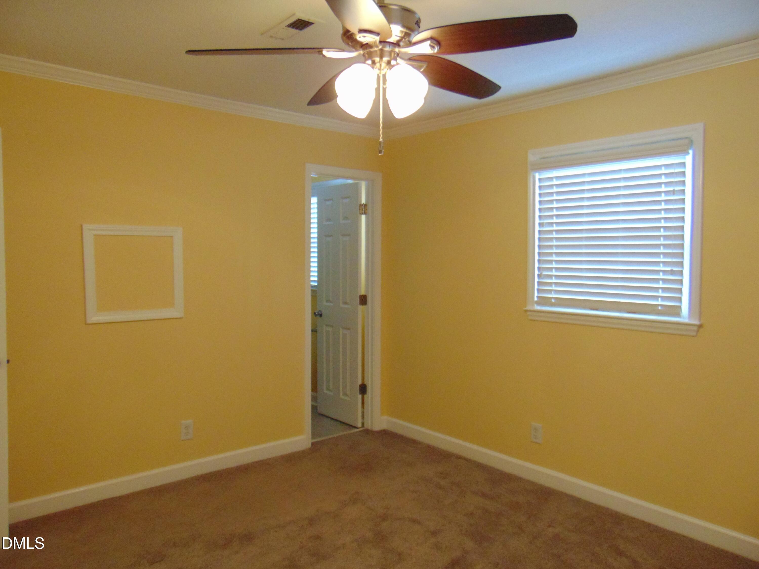 442 Gus Road Durham, NC 27703 - Photo 38 of 56 a view of an empty room with a window
