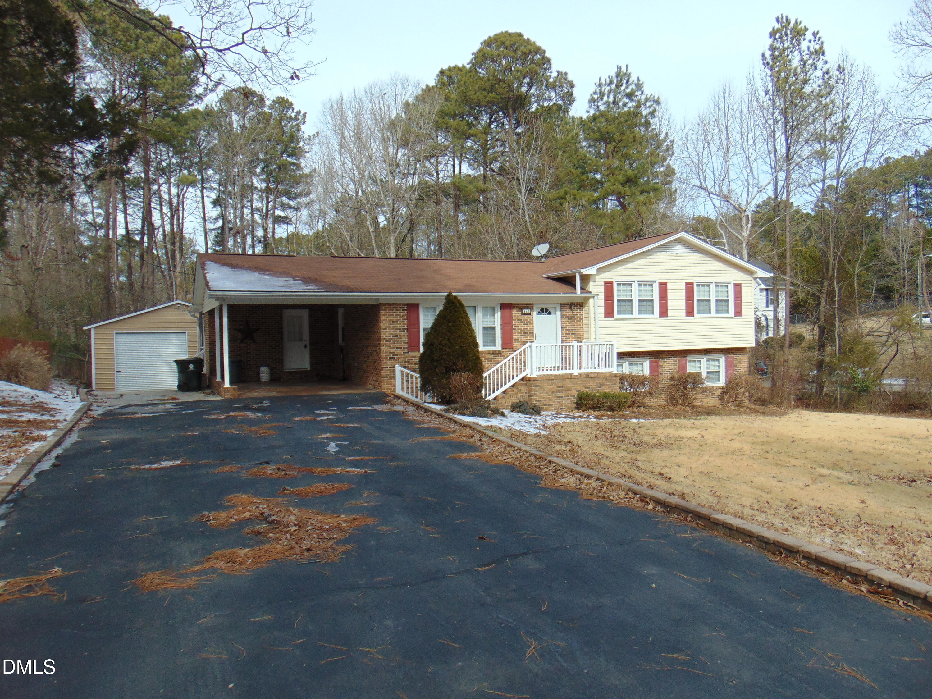 442 Gus Road Durham, NC 27703 - Photo 4 of 56 a front view of a house with a yard and garage