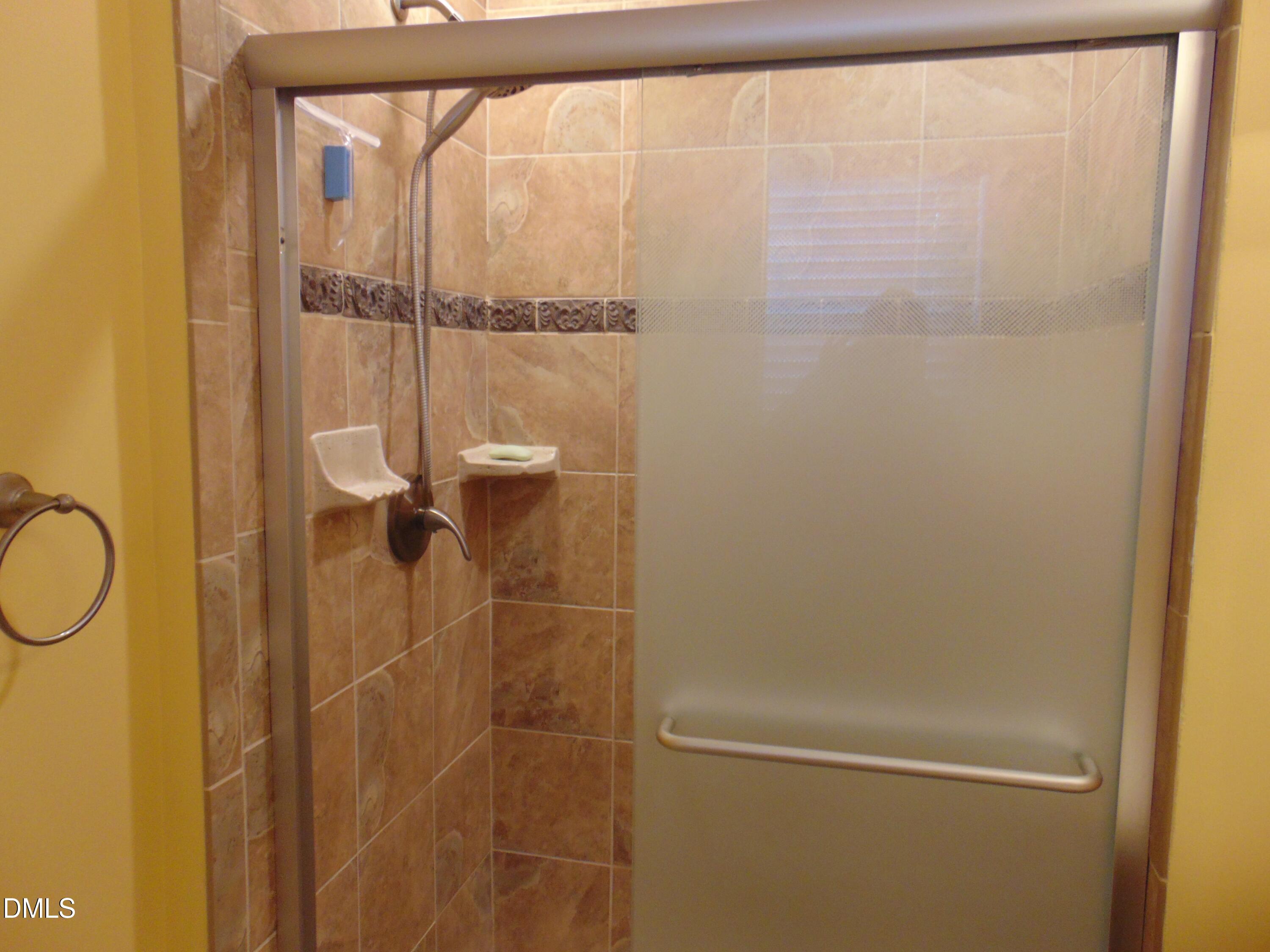 442 Gus Road Durham, NC 27703 - Photo 42 of 56 a bathroom with a shower