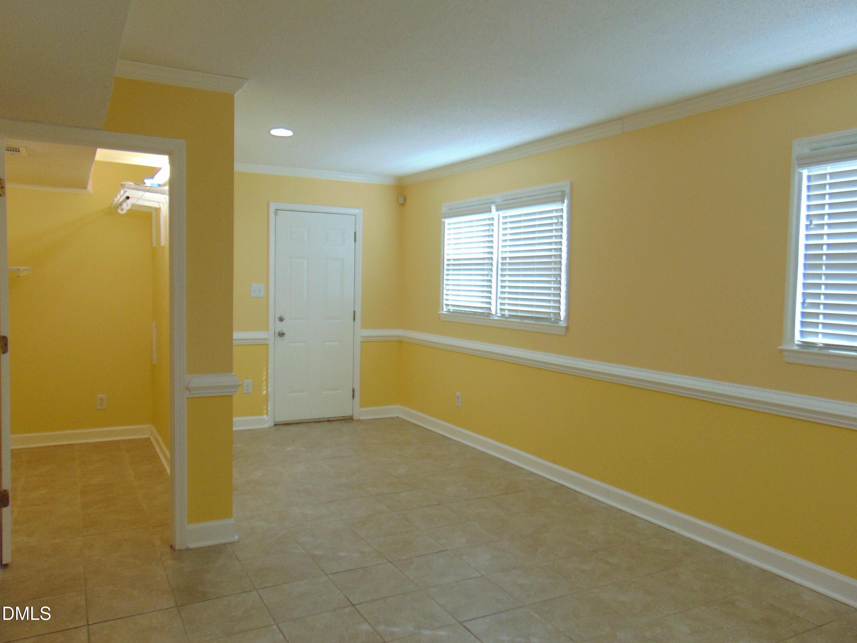 442 Gus Road Durham, NC 27703 - Photo 44 of 56 a view of an empty room with a window