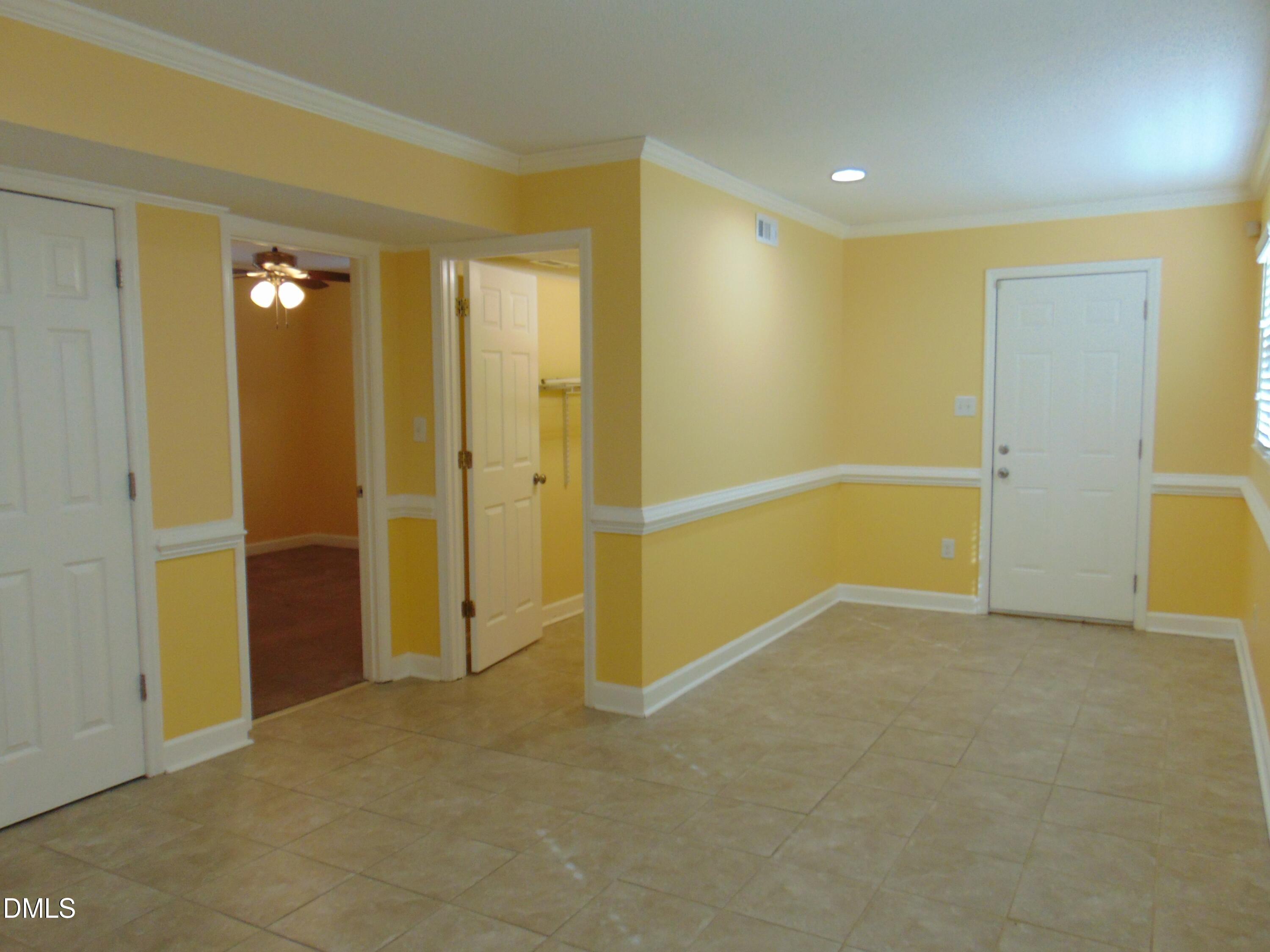 442 Gus Road Durham, NC 27703 - Photo 45 of 56 an empty room with closet area