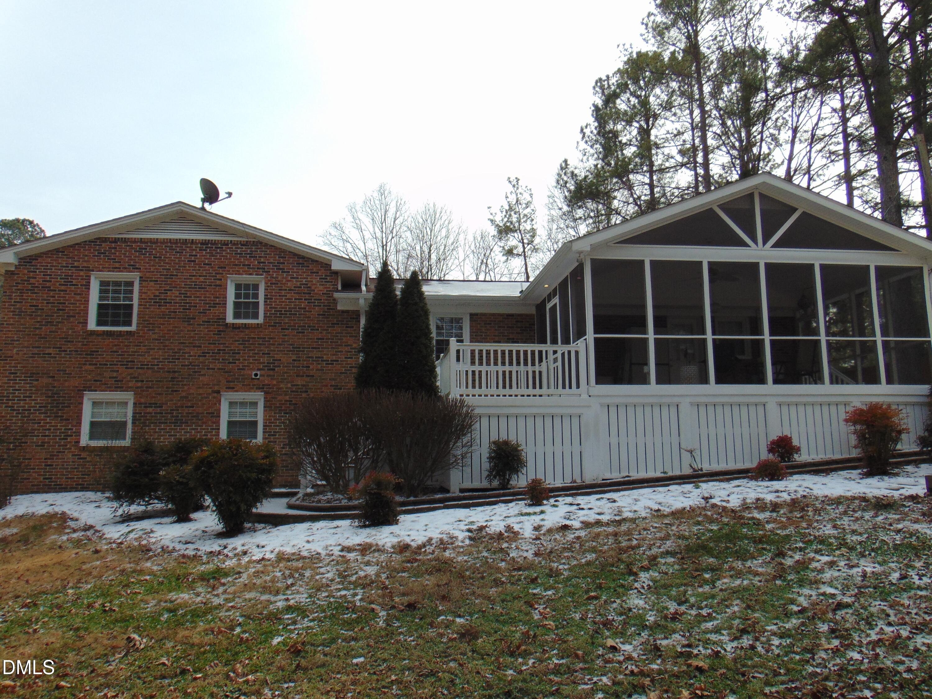 442 Gus Road Durham, NC 27703 - Photo 51 of 56 a front view of a house with a yard