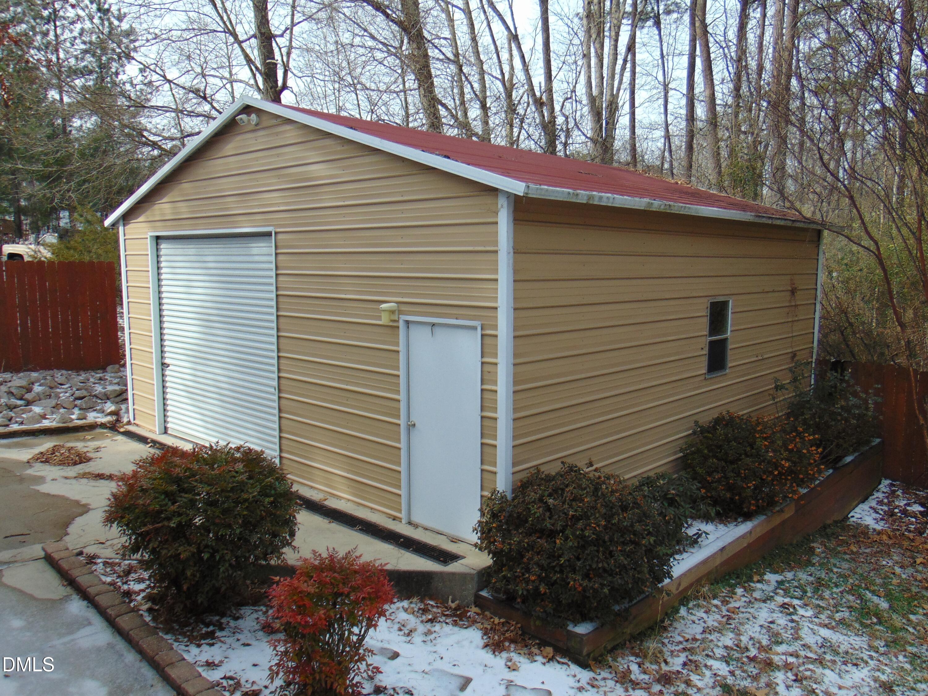 442 Gus Road Durham, NC 27703 - Photo 53 of 56 a view of a house with a yard