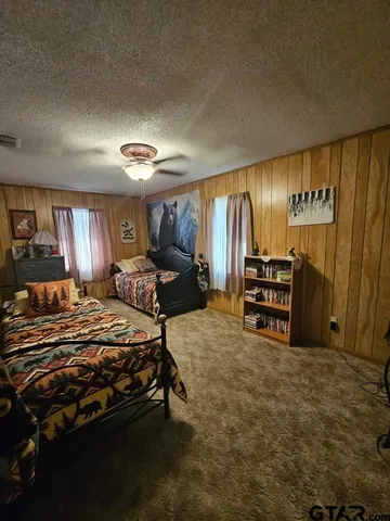 a kitchen with stainless steel appliances a refrigerator a stove a sink dishwasher and microwave