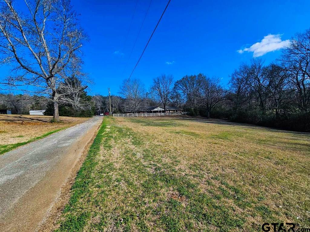 517 An County Road Palestine, TX 75801 - Photo 36 of 41 a view of a yard with a house in the background