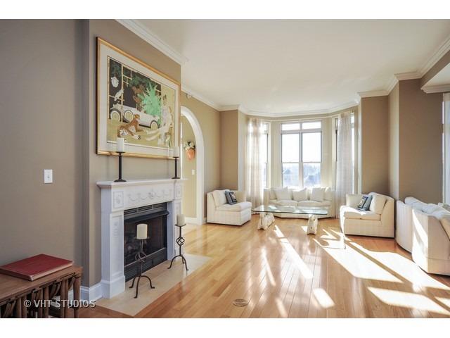 3535 Patten Road, Unit 2B Highland Park, IL 60035 - Photo 2 of 11 a living room with furniture and a fireplace