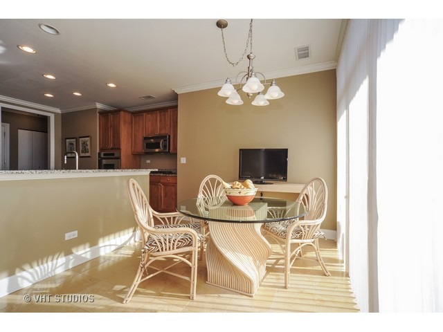3535 Patten Road, Unit 2B Highland Park, IL 60035 - Photo 7 of 11 a view of a dining room with furniture