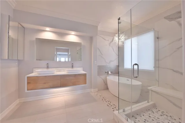 an aerial view of a house with a yard and a outdoor space