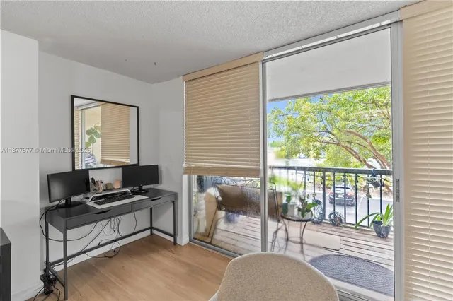 a workspace with furniture and a window