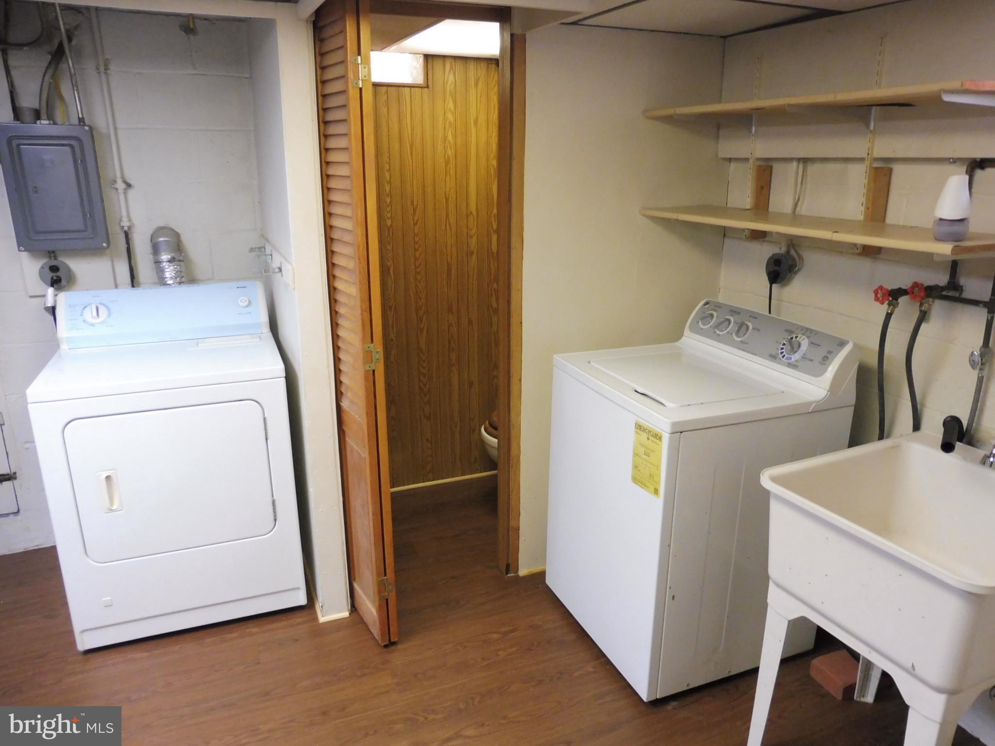 3648 Clarenell Road Baltimore, MD 21229 - Photo 19 of 25 Laundry/Utility/Storage room with flush
