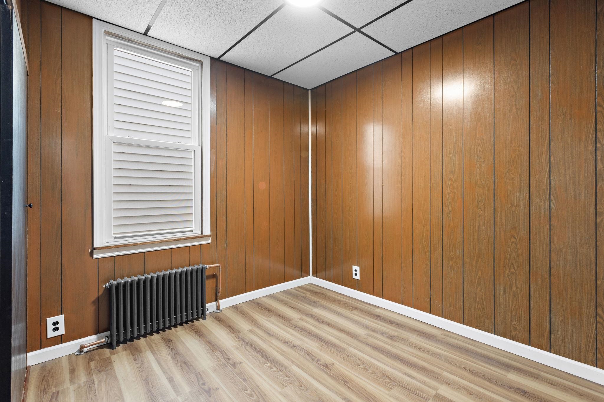 379 Union Street, Unit 2 Jersey City, NJ 07304 - Photo 14 of 20 a view of a room with wooden walls