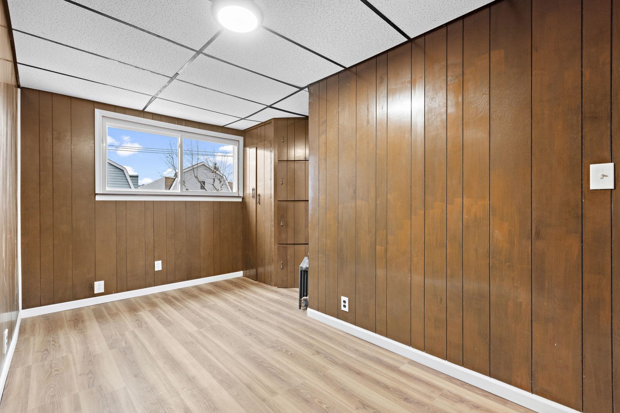 379 Union Street, Unit 2 Jersey City, NJ 07304 - Photo 19 of 20 a view of an empty room with wooden floor
