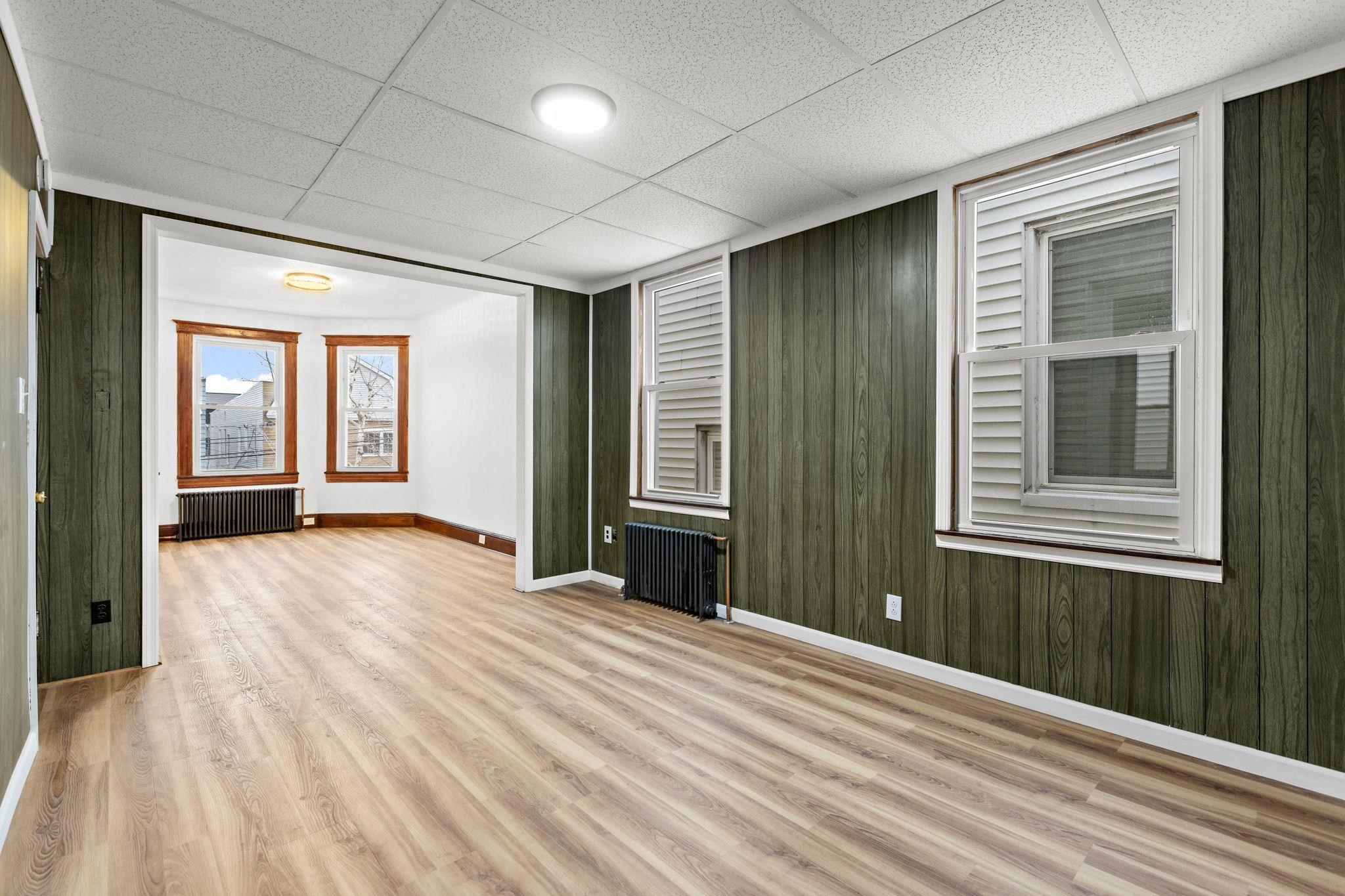 379 Union Street, Unit 2 Jersey City, NJ 07304 - Photo 5 of 20 a view of an empty room with a window