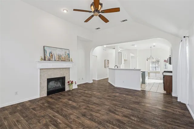 a view of kitchen with wooden floor and window