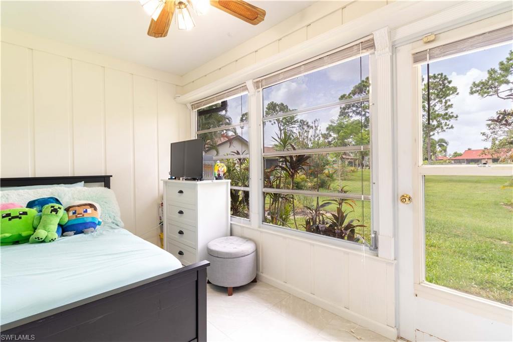 1014 Pine Isle Lane, Unit 1014 Naples, FL 34112 - Photo 10 of 20 a very nice looking room with a large window