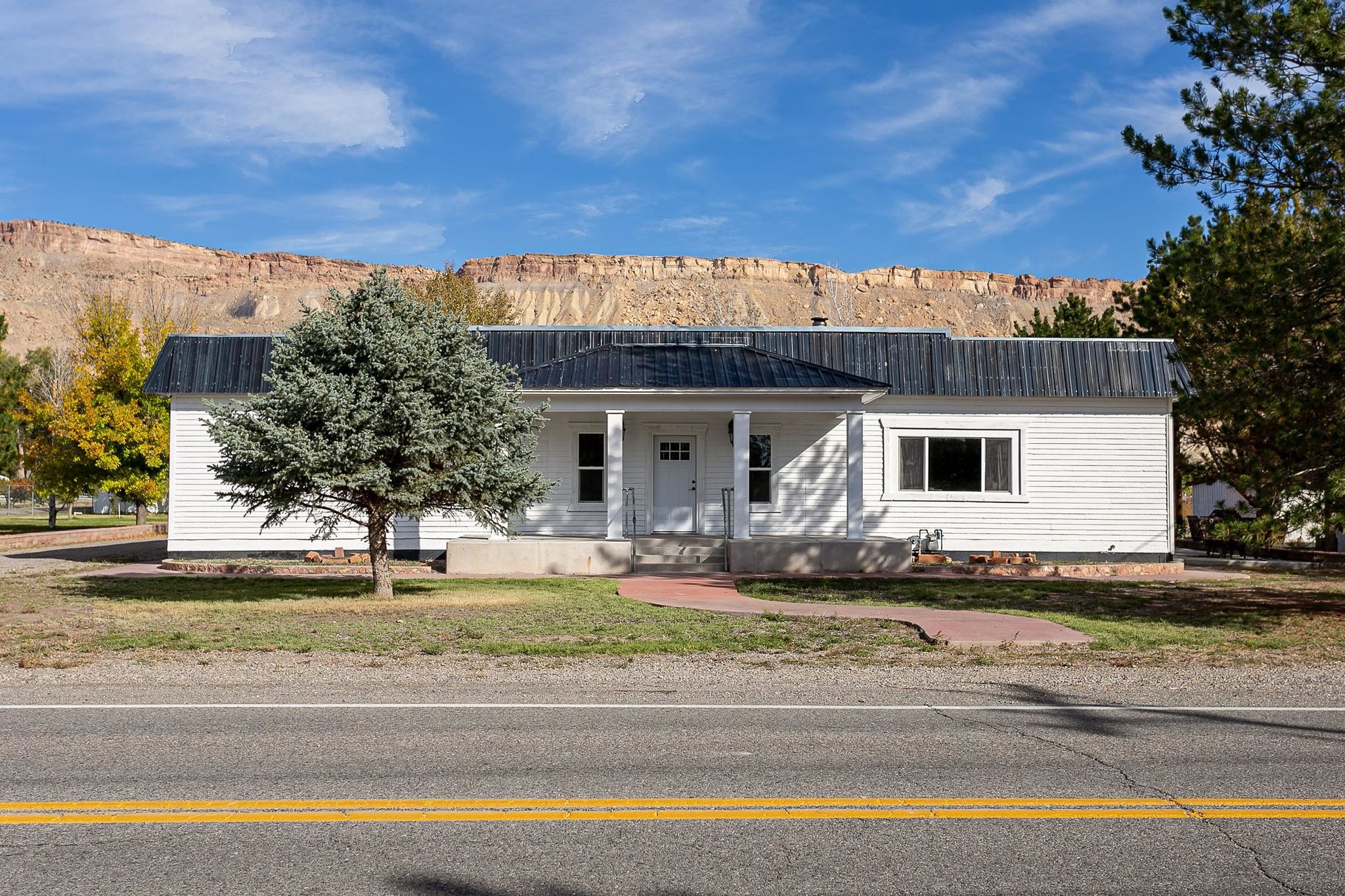 3612 G Road Palisade, CO 81526 - Photo 1 of 38 a view of a house with a swimming pool