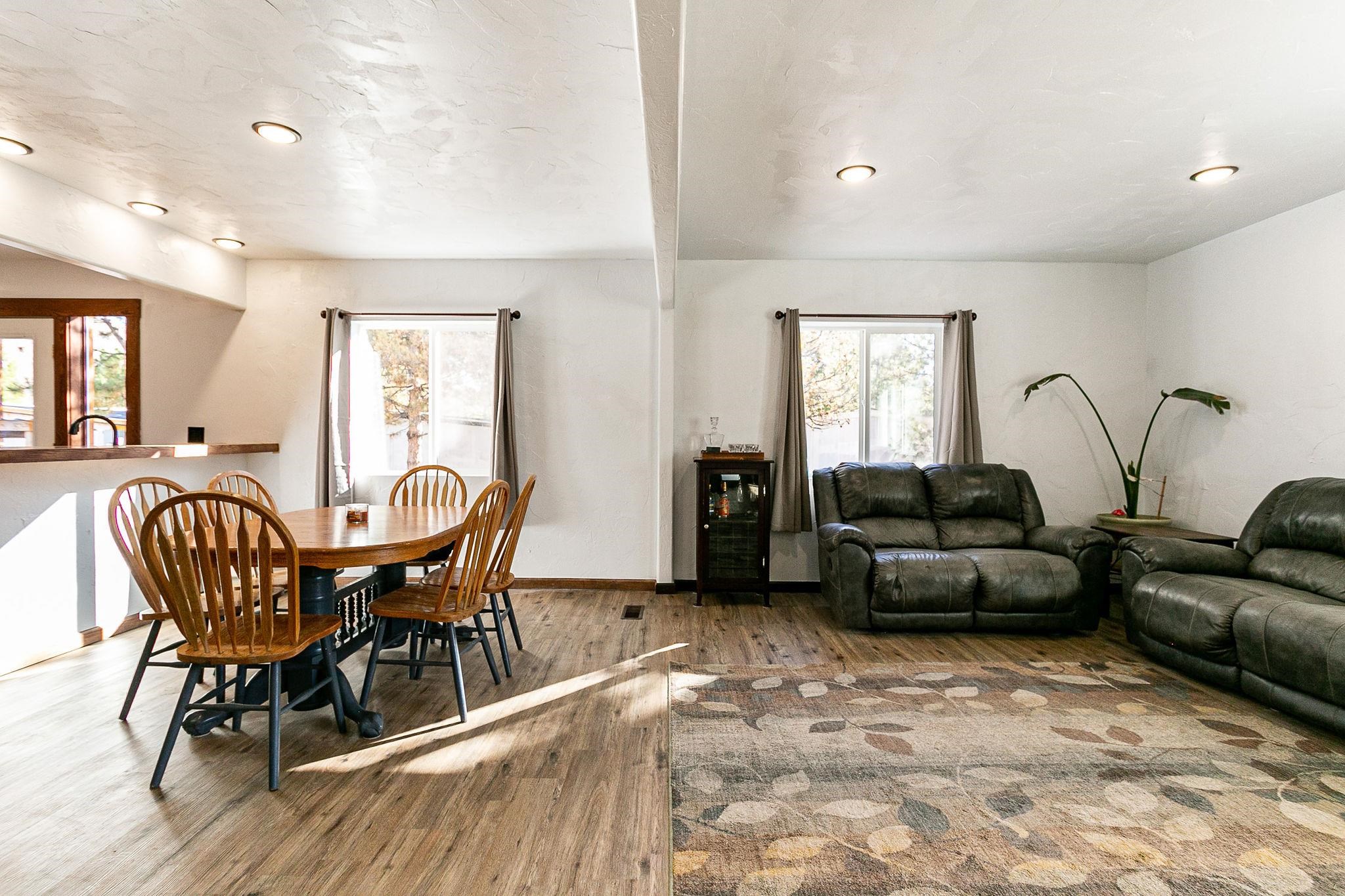 3612 G Road Palisade, CO 81526 - Photo 12 of 38 a living room with furniture wooden floor and a window
