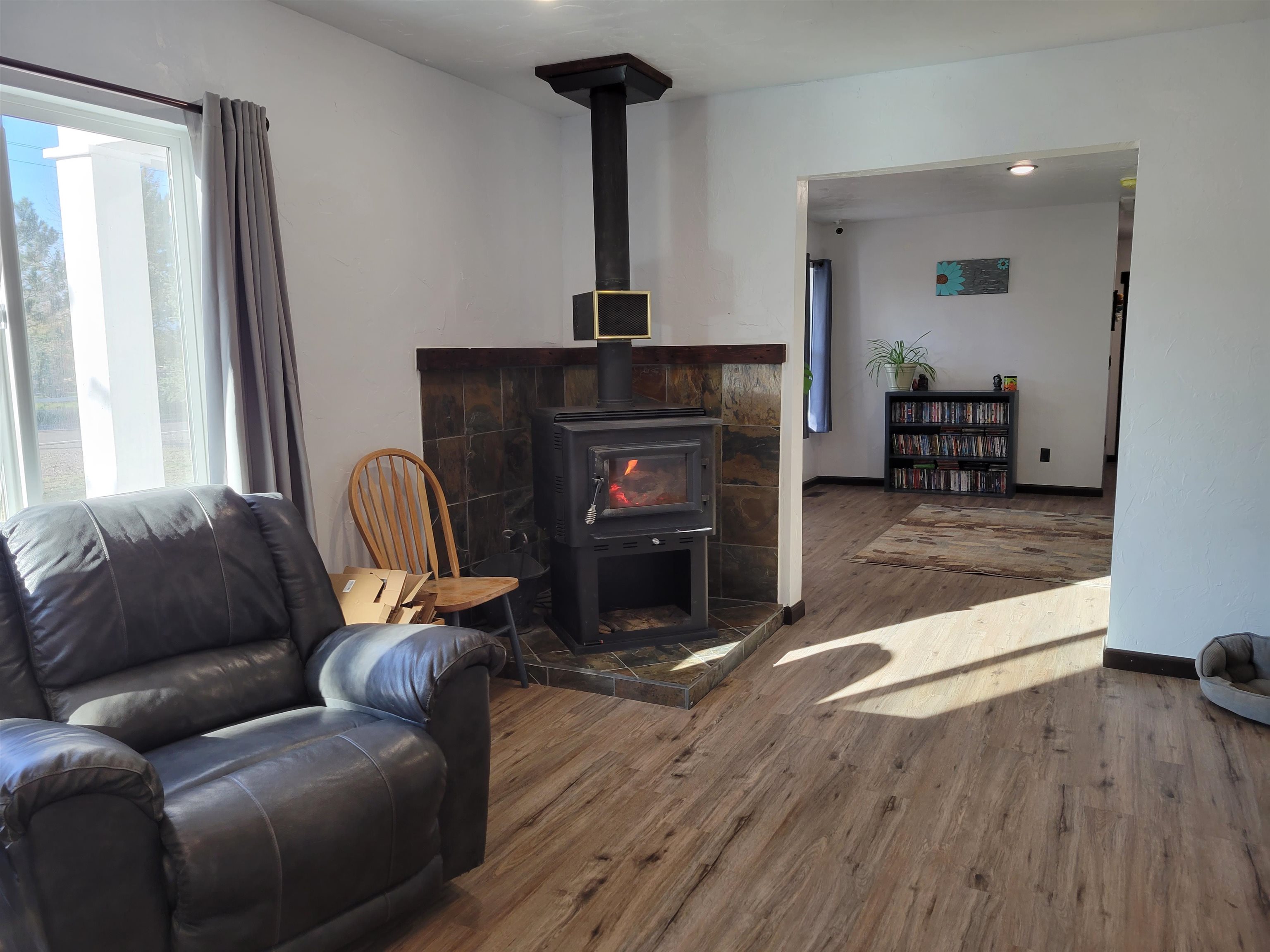 3612 G Road Palisade, CO 81526 - Photo 15 of 38 a living room with furniture and a fireplace