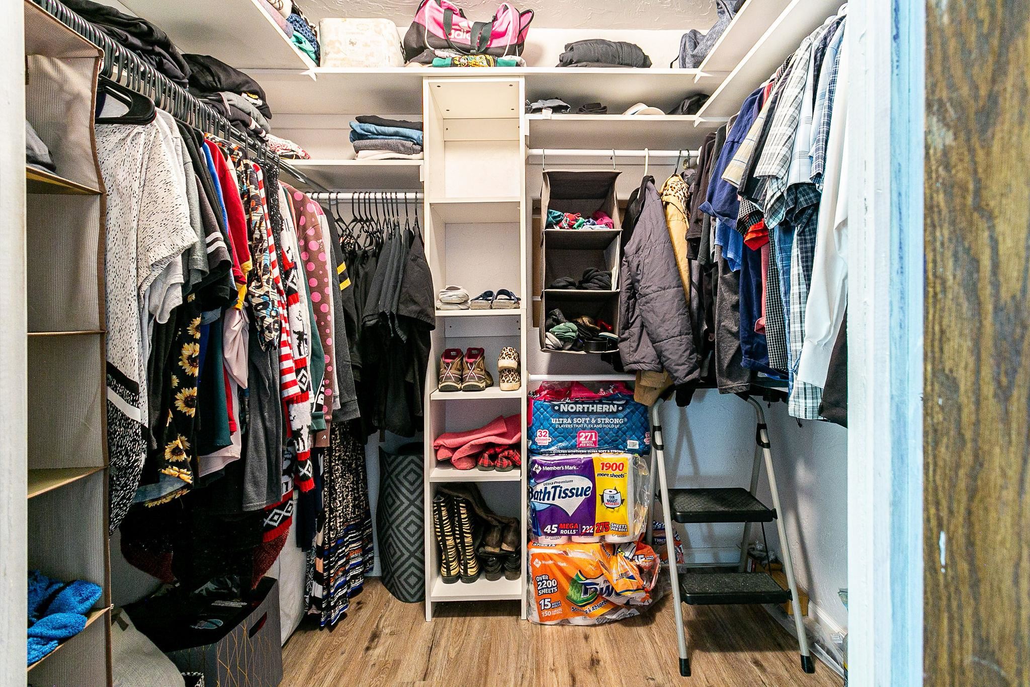 3612 G Road Palisade, CO 81526 - Photo 25 of 38 a view of walk in closet with clothes and shoes