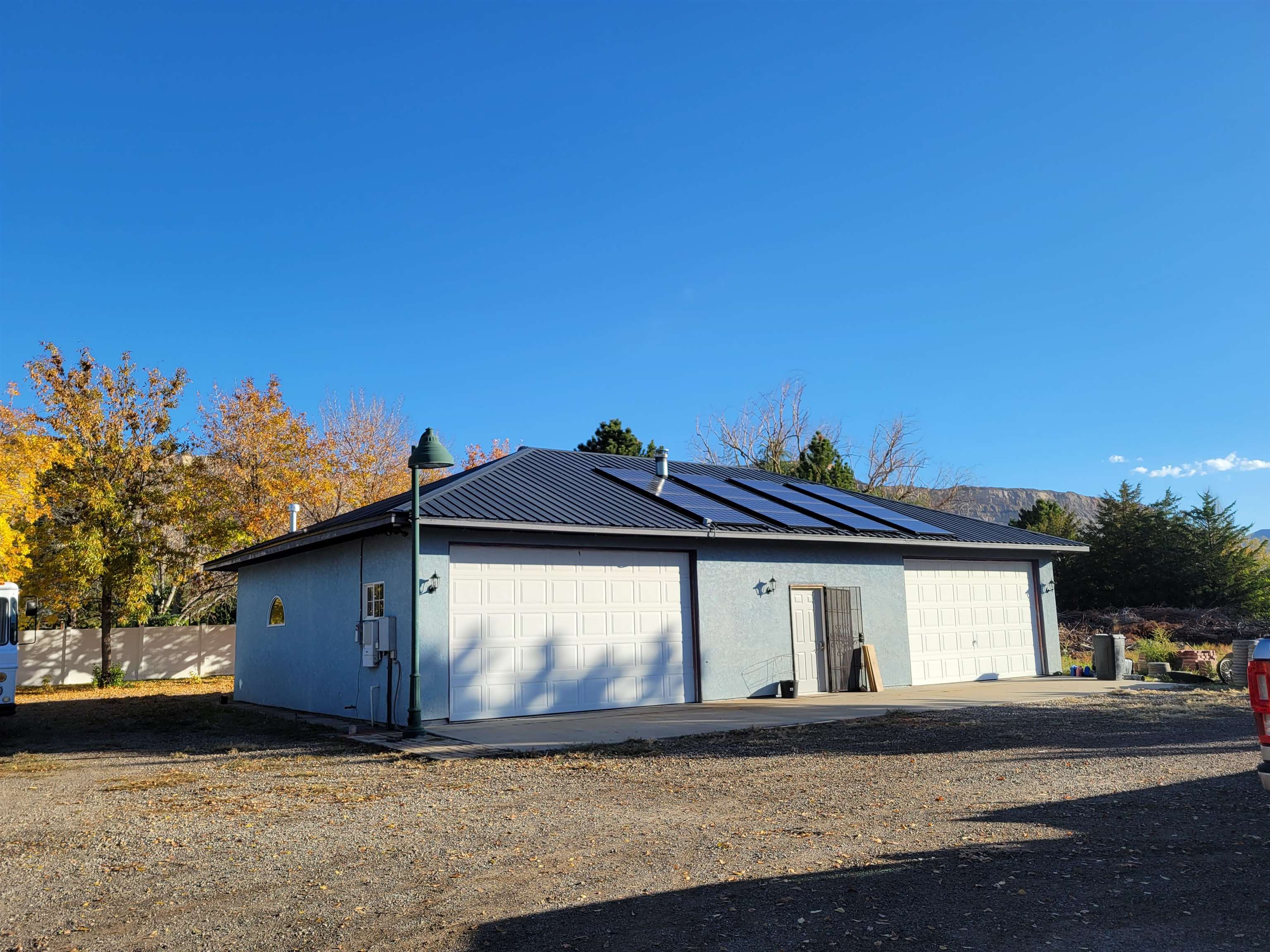 3612 G Road Palisade, CO 81526 - Photo 28 of 38 a front view of a house with a garden