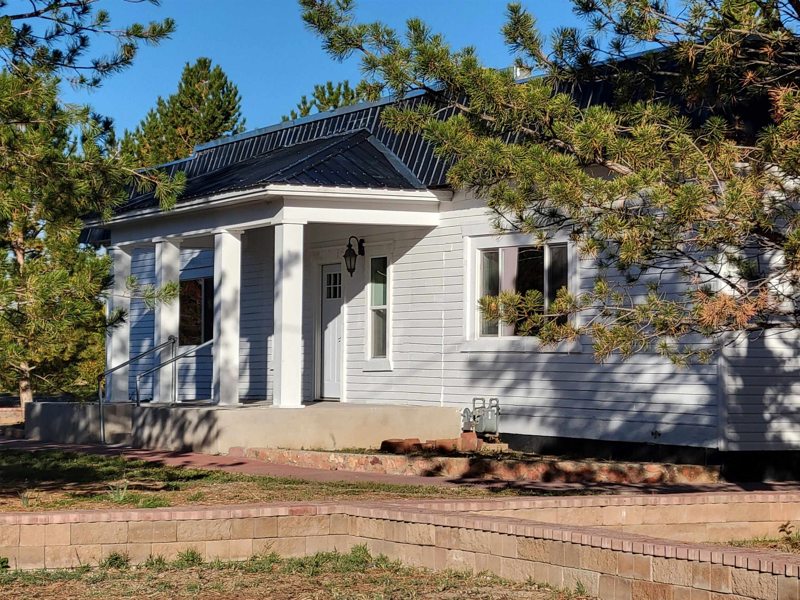 3612 G Road Palisade, CO 81526 - Photo 3 of 38 a front view of a house with a yard