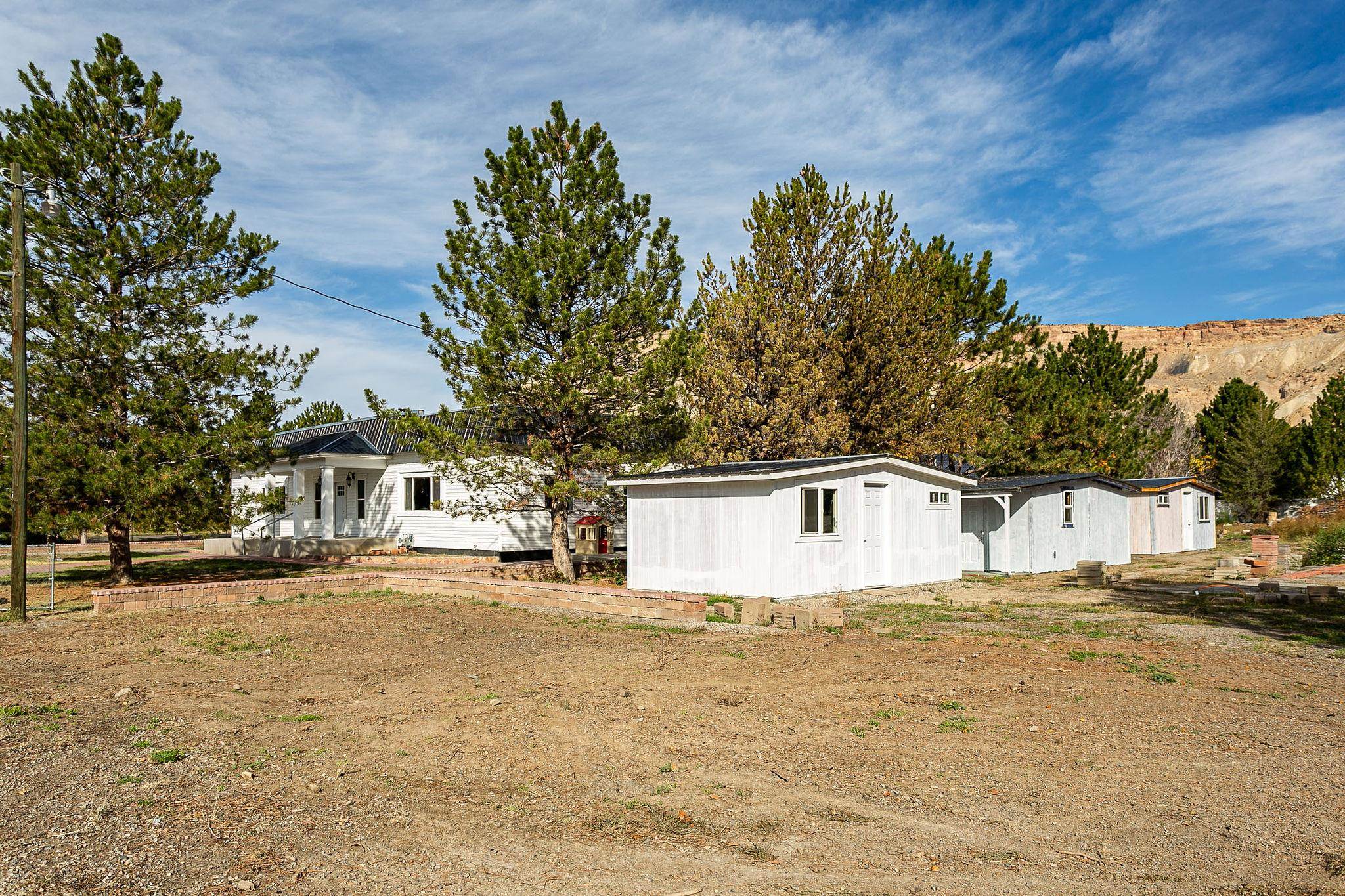 3612 G Road Palisade, CO 81526 - Photo 6 of 38 a front view of a house with a yard