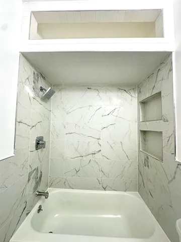 a bathroom with a bathtub