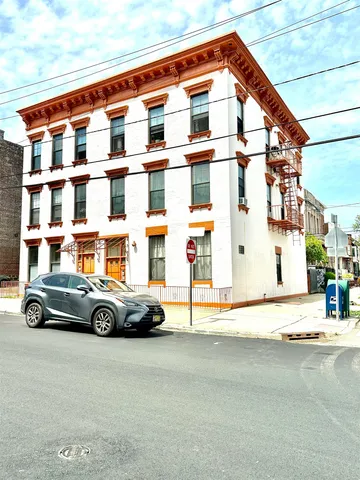a car parked in front of a building