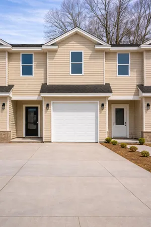 a view of a house with a street