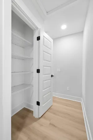 a view of an empty walk in closet