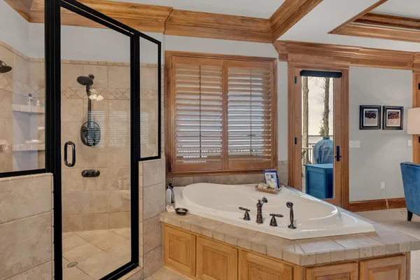 a bathroom with a tub and a sink