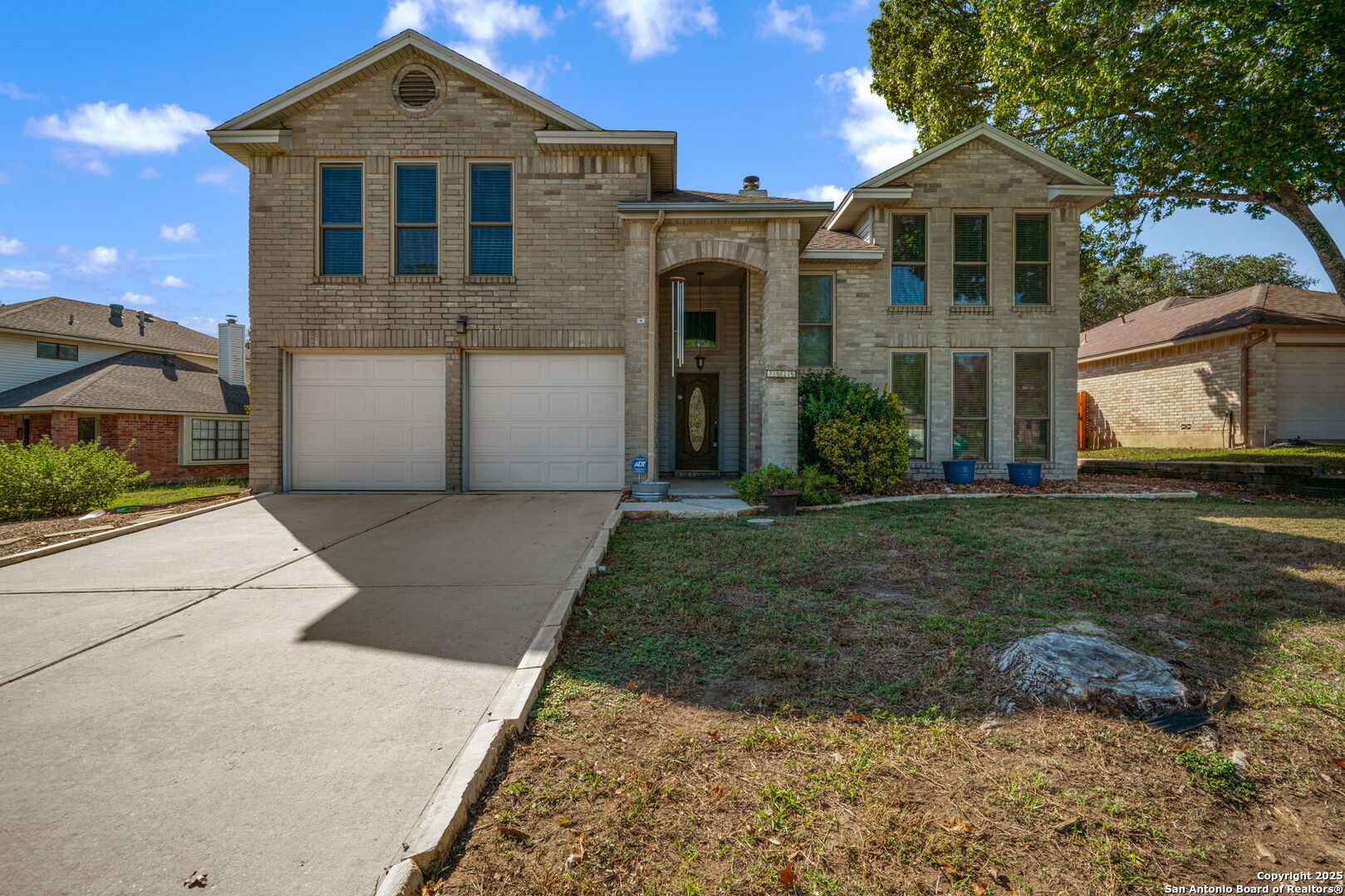 7515 Forest Edge Live Oak, TX 78233 - Photo 1 of 30 a front view of a house with a yard