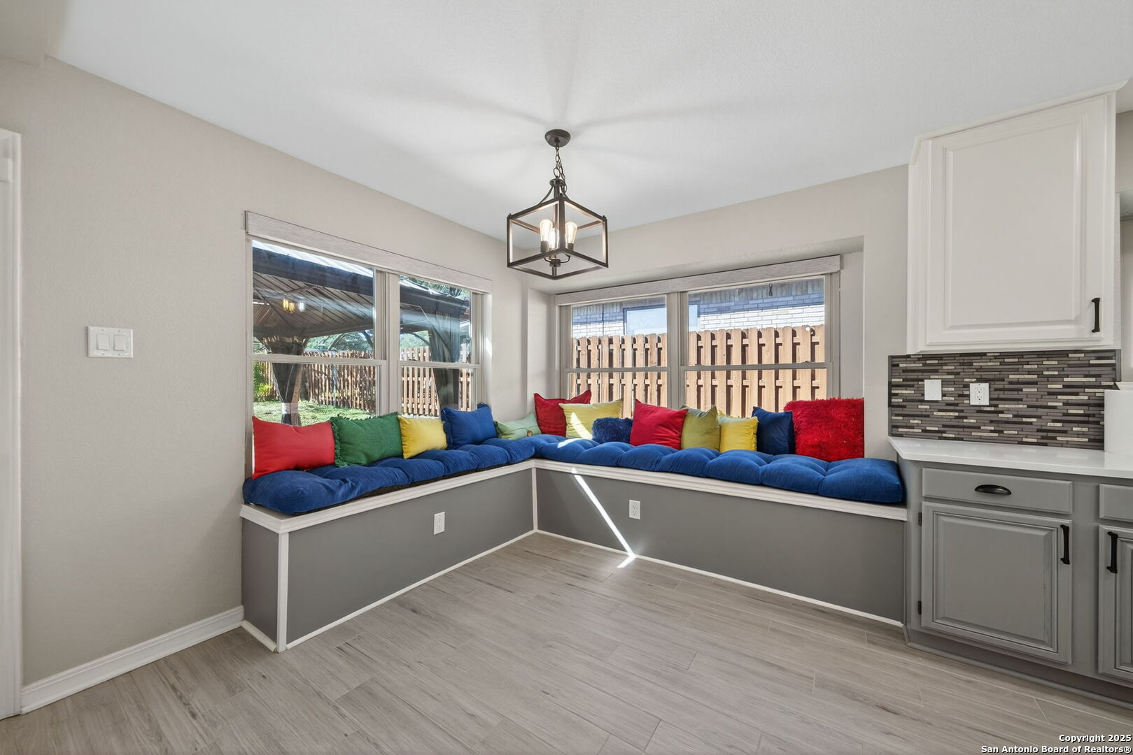 7515 Forest Edge Live Oak, TX 78233 - Photo 12 of 30 a room with wooden floor and window