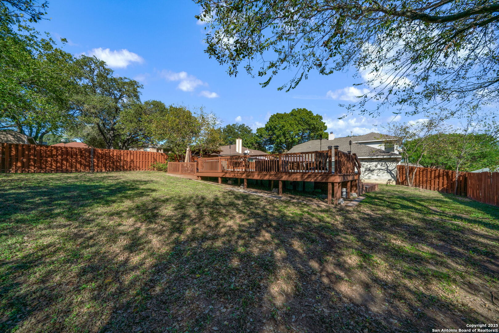 7515 Forest Edge Live Oak, TX 78233 - Photo 29 of 30 a backyard of a house with lots of green space
