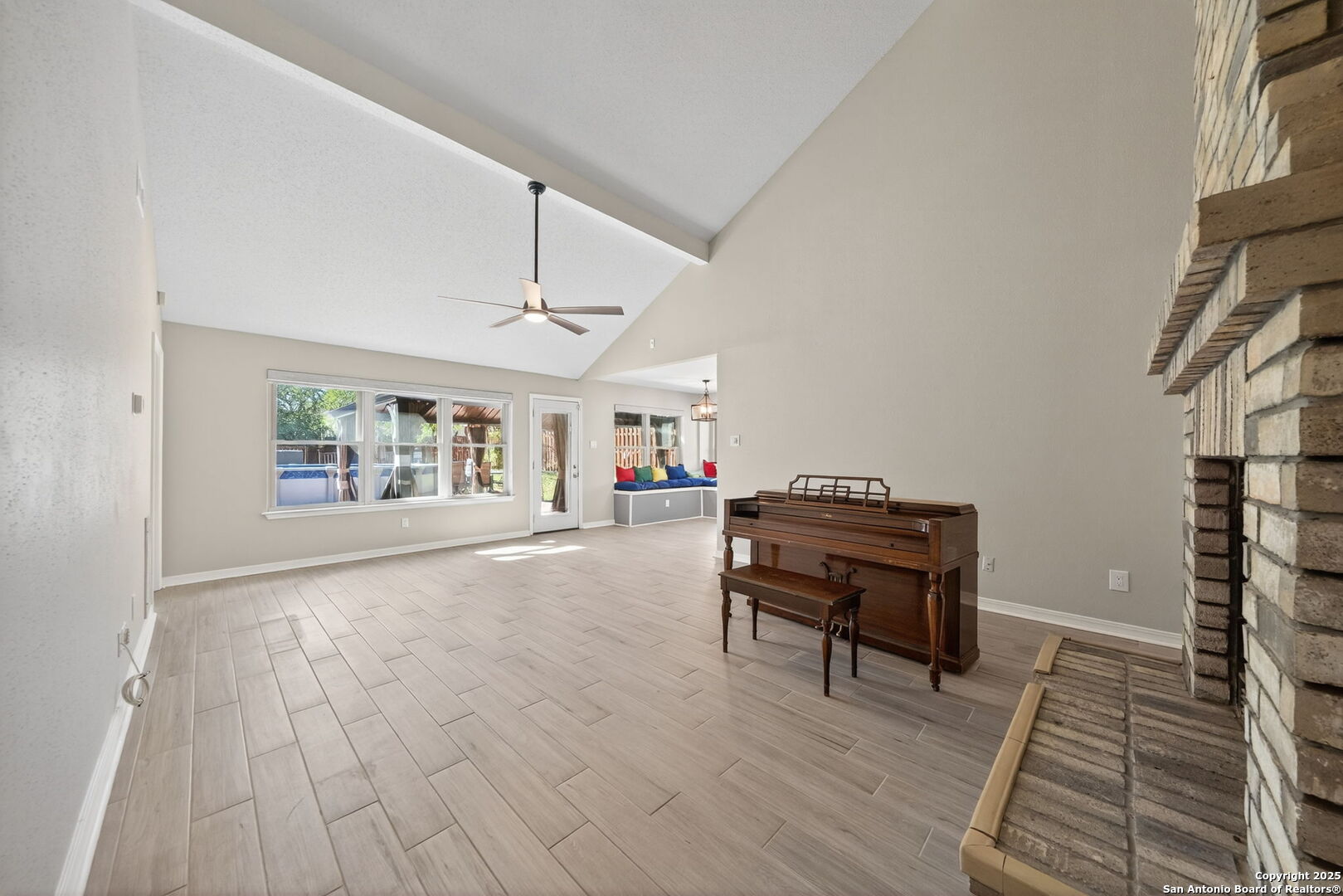 7515 Forest Edge Live Oak, TX 78233 - Photo 6 of 30 a living room with furniture and a piano