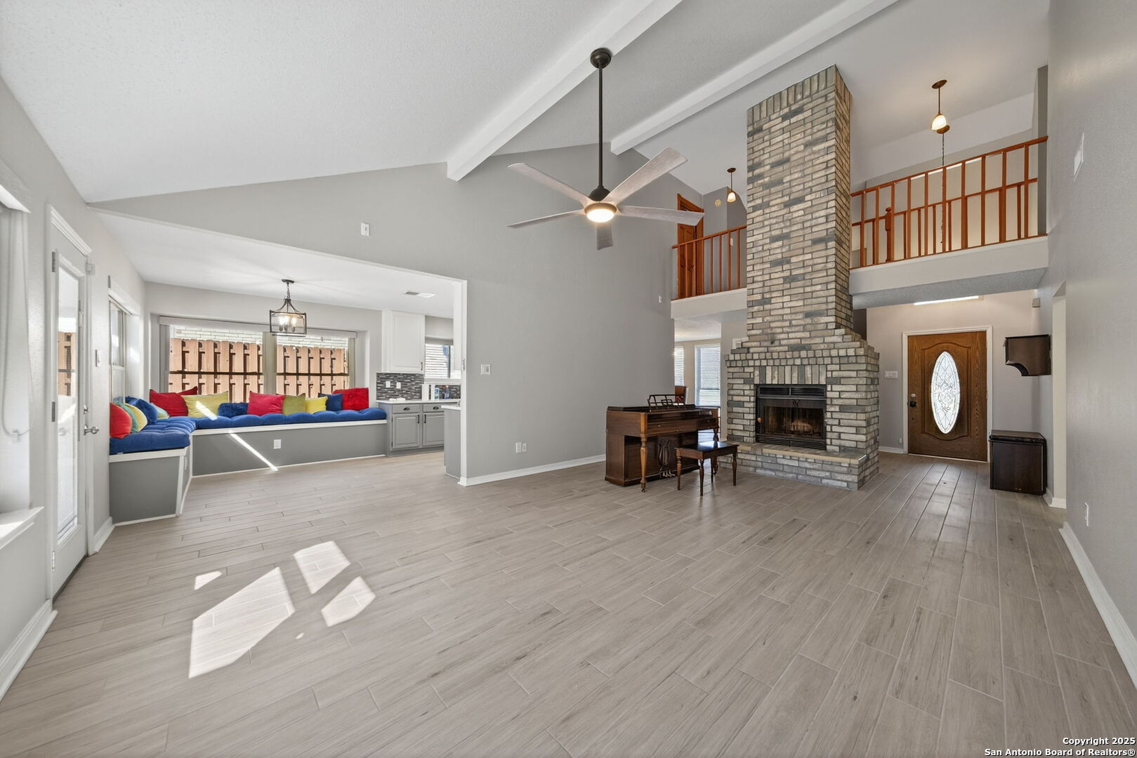 7515 Forest Edge Live Oak, TX 78233 - Photo 7 of 30 a living room with furniture and a fireplace