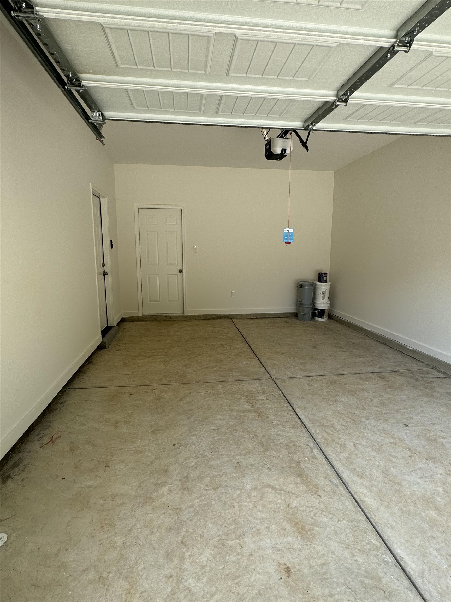12370 South Main Street Somerville, TN 38068 - Photo 23 of 26 Spacious garage with light-colored walls and a concrete floor
