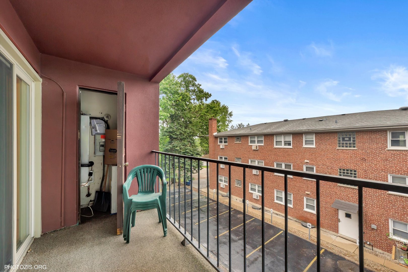 4838 West Howard Street, Unit 301 Skokie, IL 60077 - Photo 26 of 32 a view of a house with wooden floor roof and floor to ceiling window