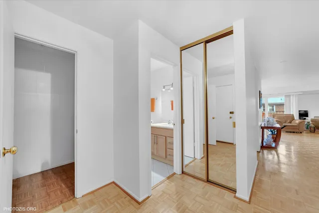 a view of a livingroom and a livingroom with furniture