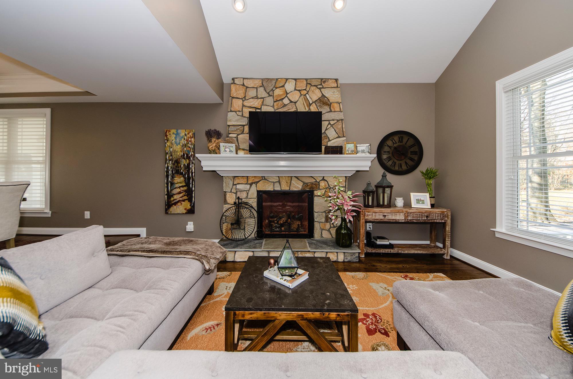 403 Tapawingo Road Southwest Vienna, VA 22180 - Photo 24 of 59 Stone Fireplace in Family room